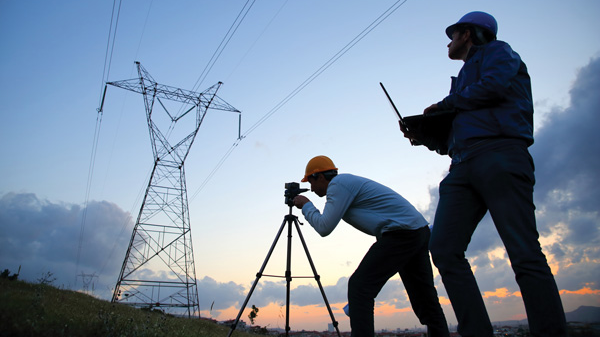 Engineers survey a work site